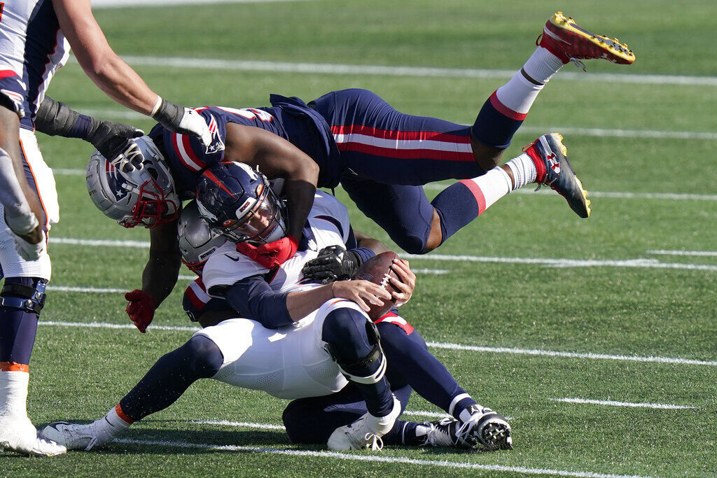 APTOPIX Broncos Patriots Football